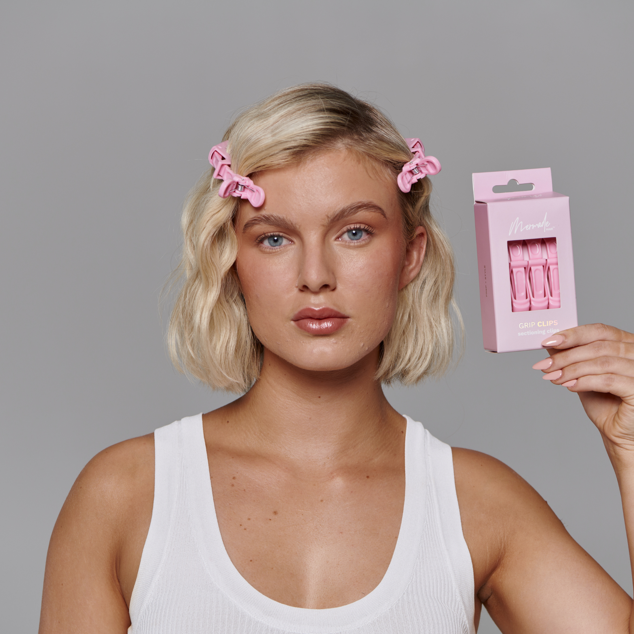 Model using the Mermade Hair Grip Clips in Signature Pink