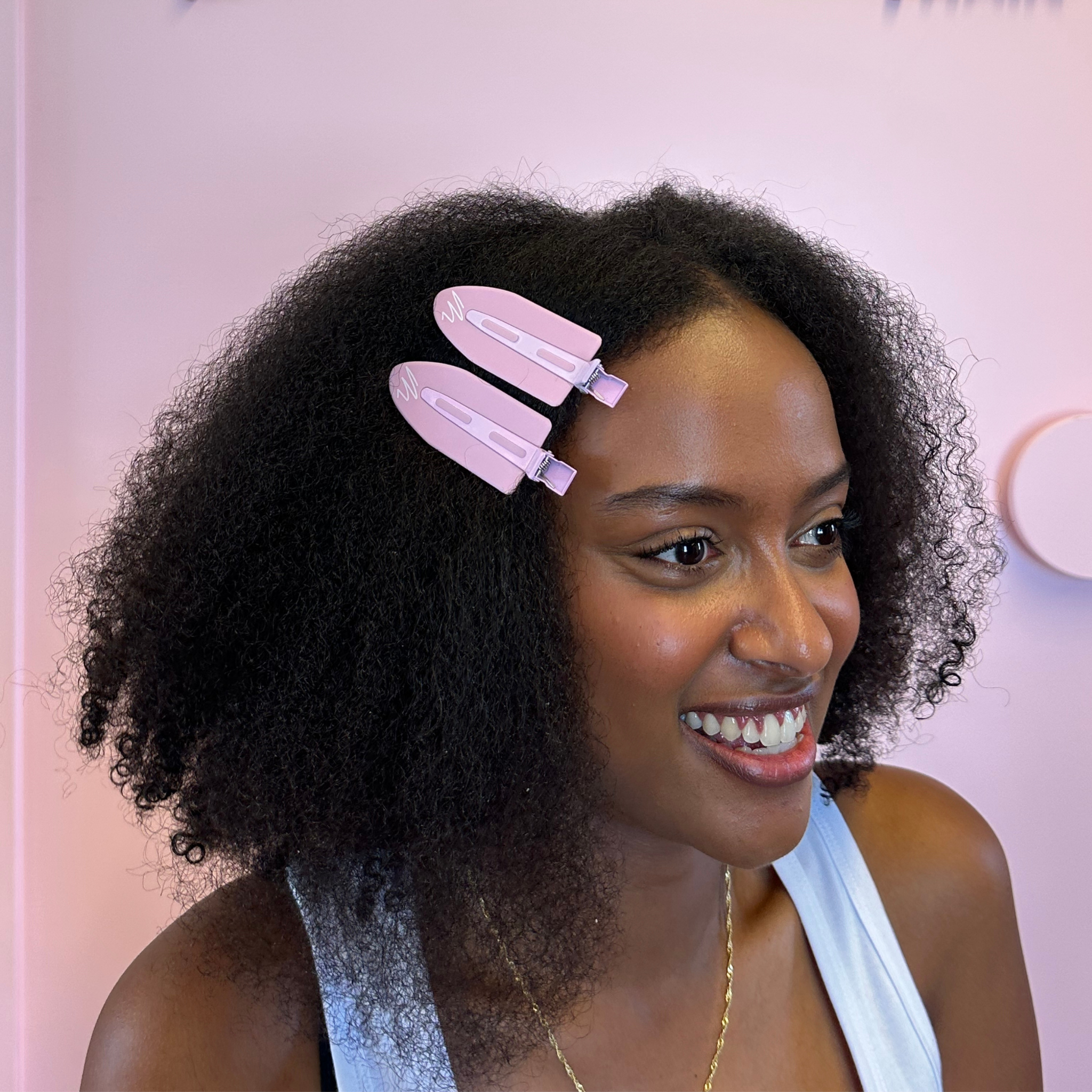 Model using the Mermade Hair Jumbo No Crease Clips - textured hair