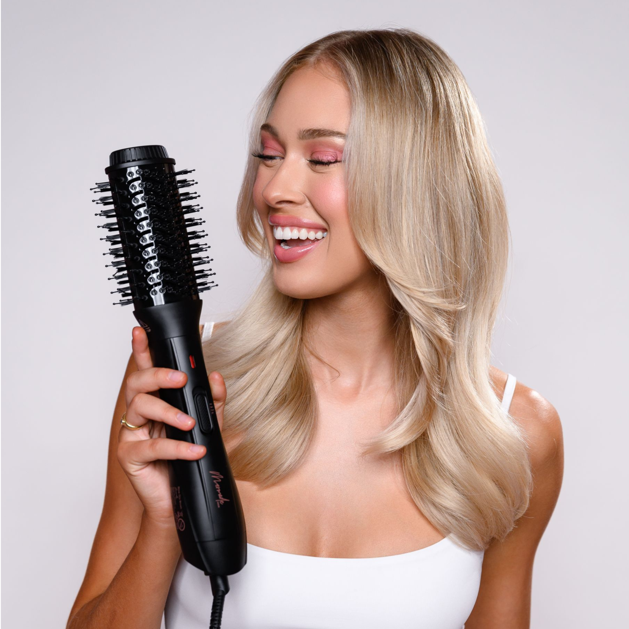 Model using the Blow Dry Brush - Sleek Black