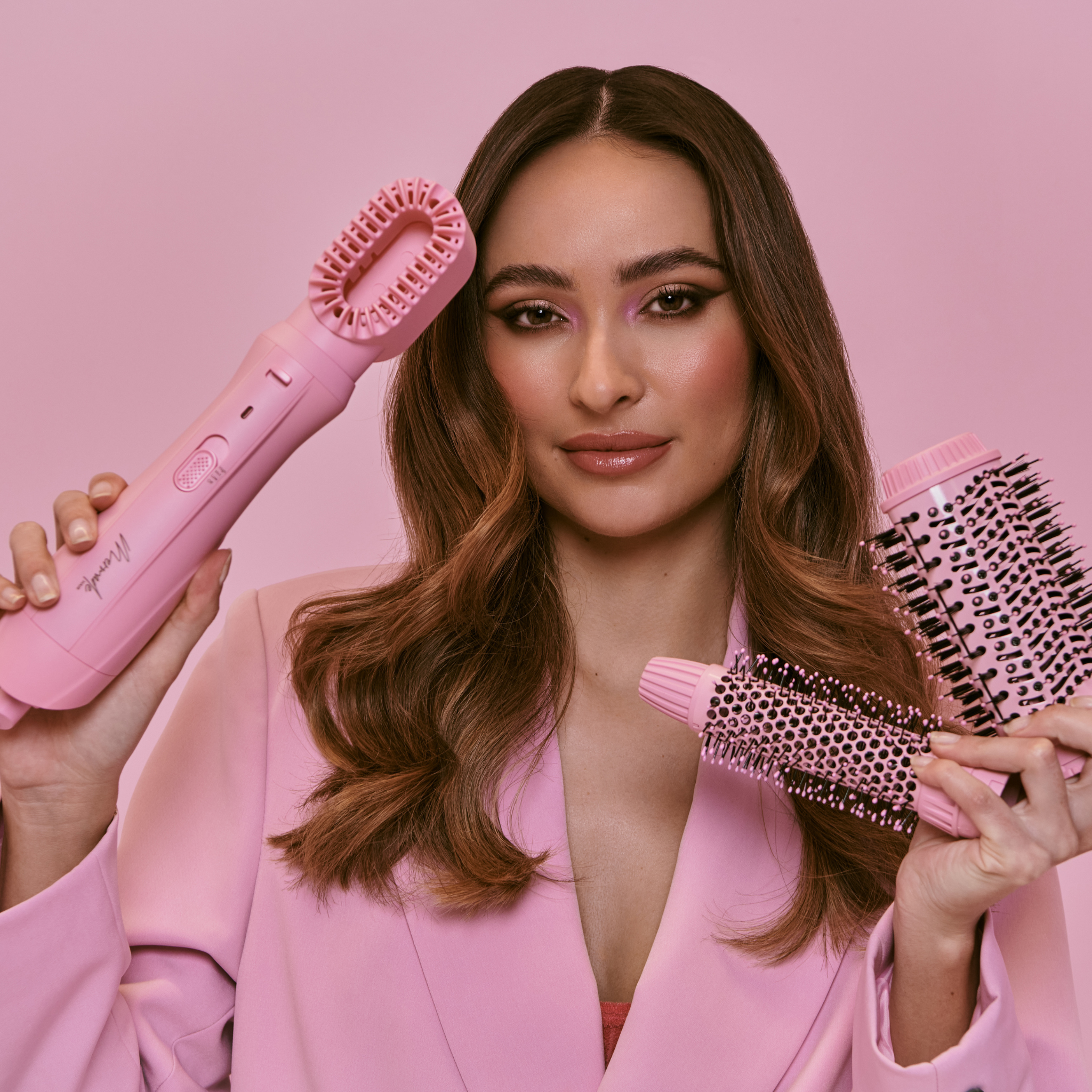 Model using the Interchangeable Blow Dry Brush - Pink 