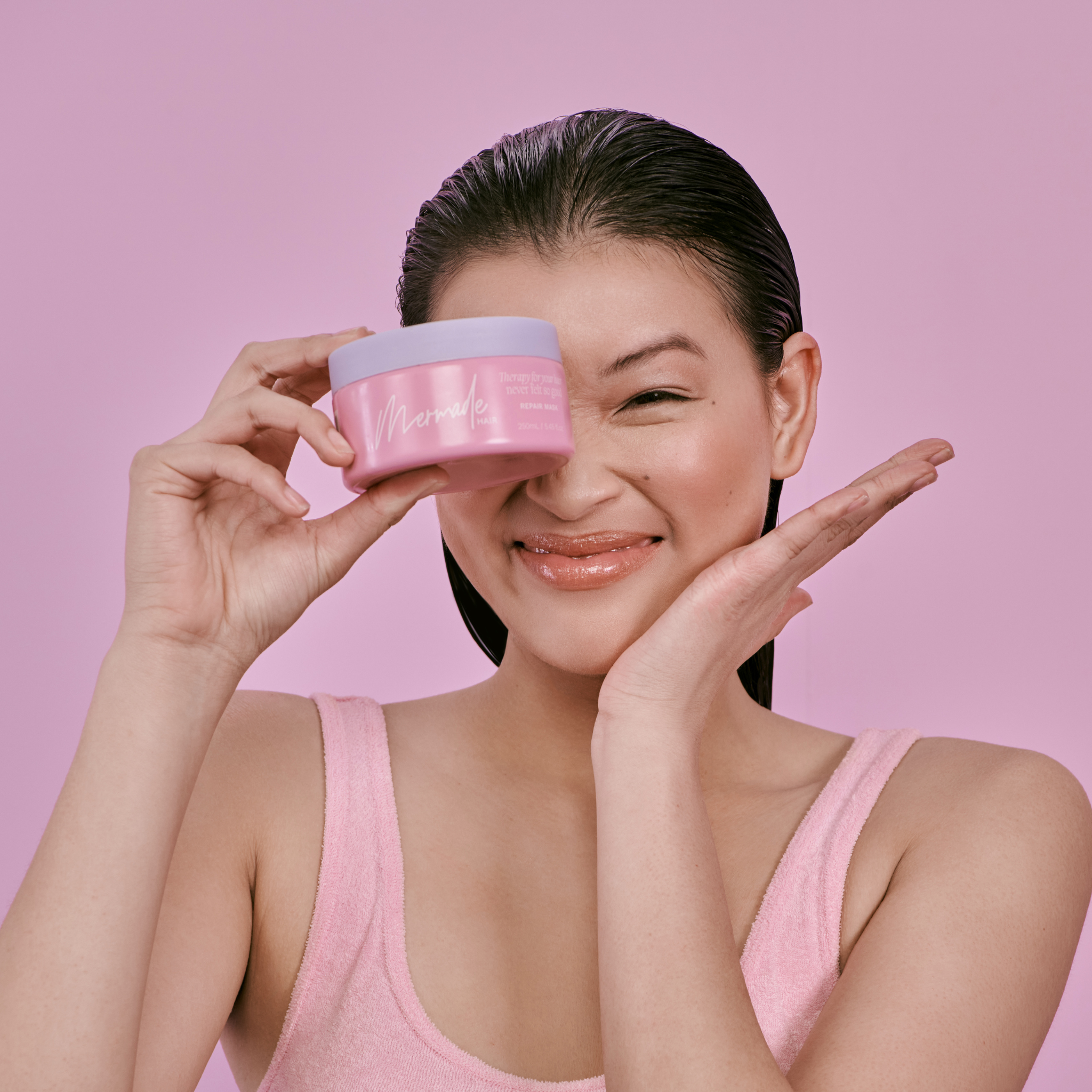 Model using the Mermade Hair Repair Mask 