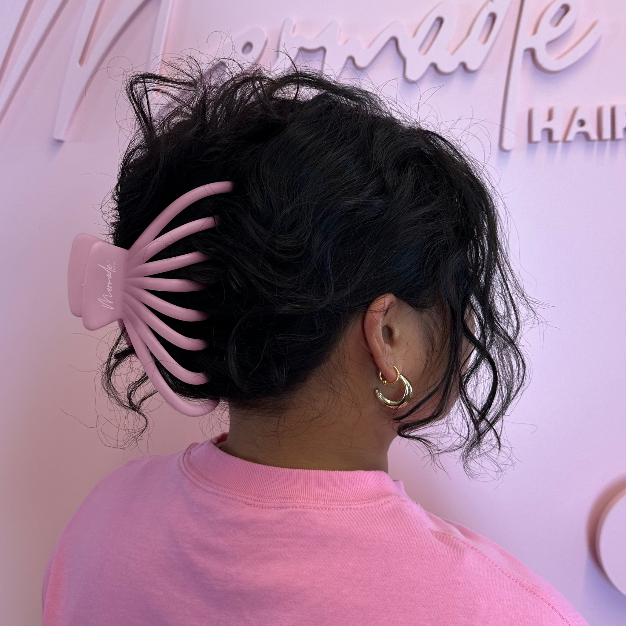 Model using the Mermade Hair Pink Octopus Clip