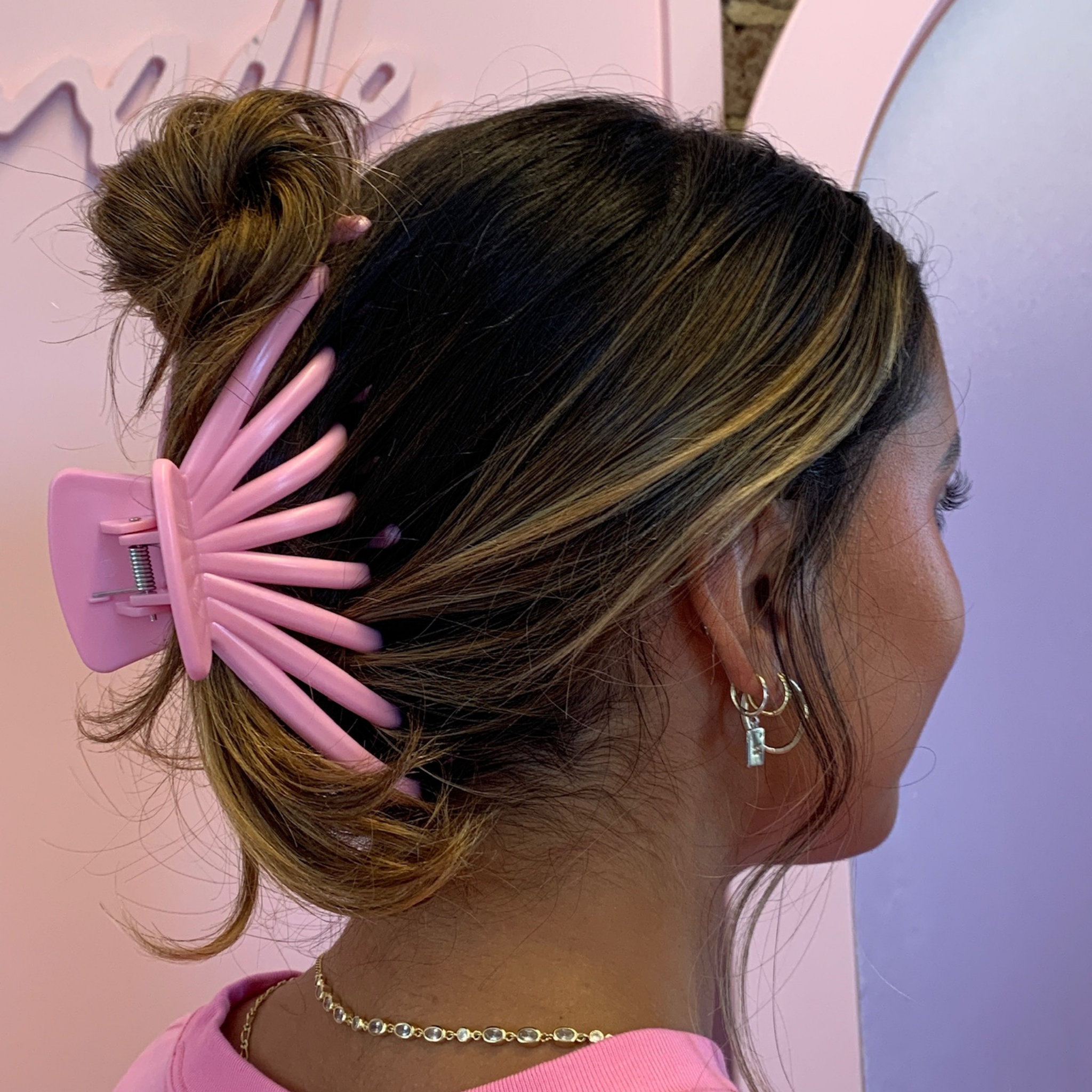 Model using the Mermade Hair Pink Octopus Clip