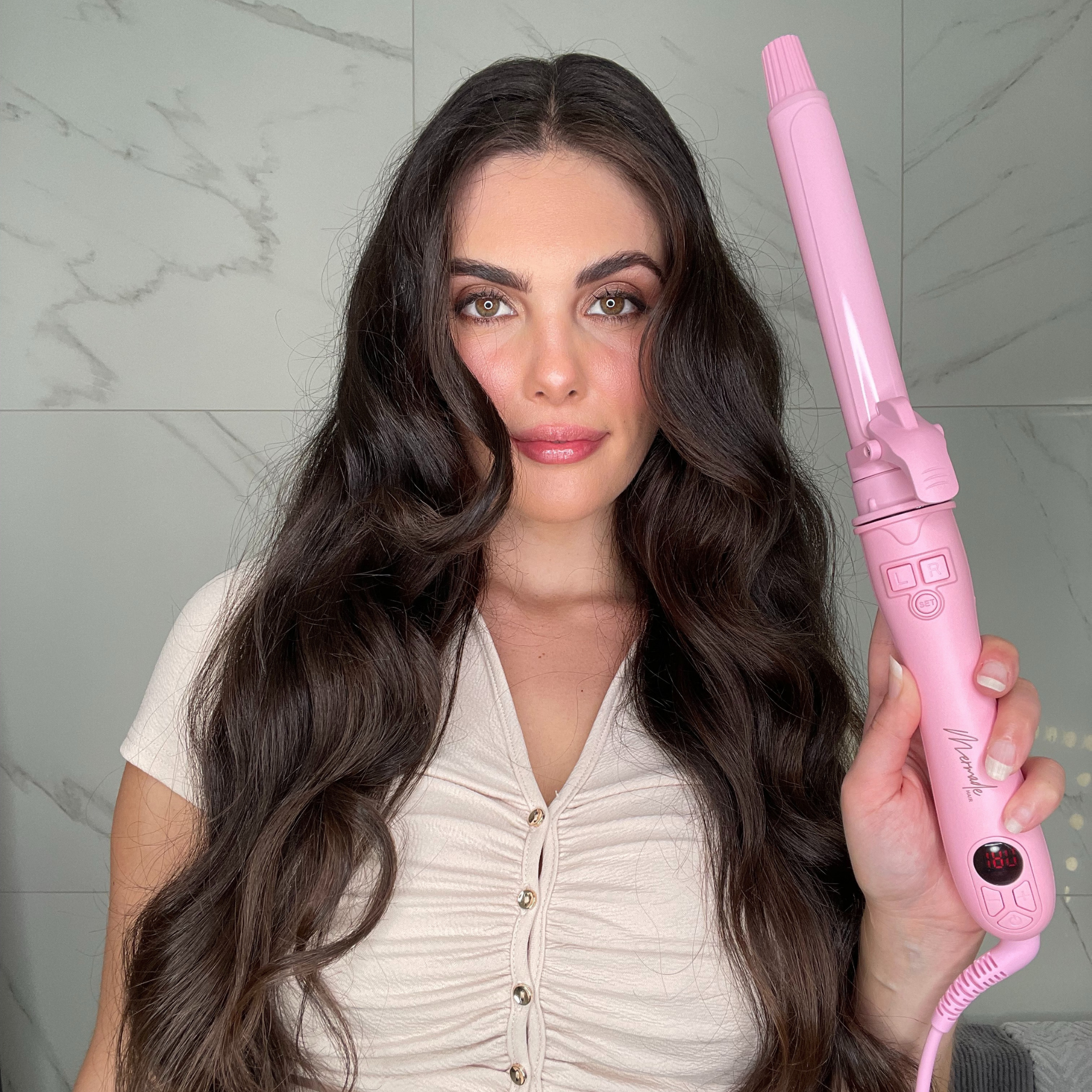 Model using the Mermade Hair Spin Pink